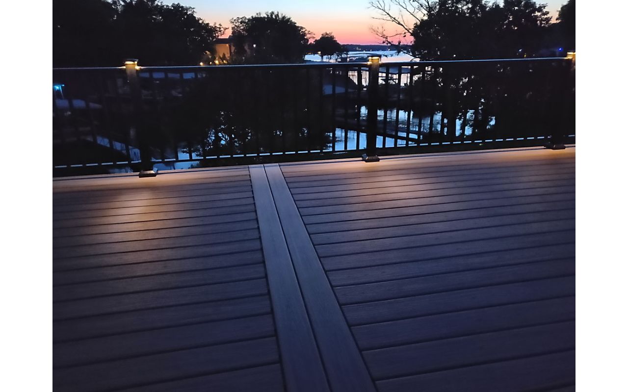 Trex Island Mist decking, Black aluminum railing with low voltage LED post lights done in Lake Ozark, MO