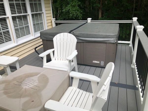 This Trex deck has a great entertaining & dinning area as well as a relaxation element with the new hot tub