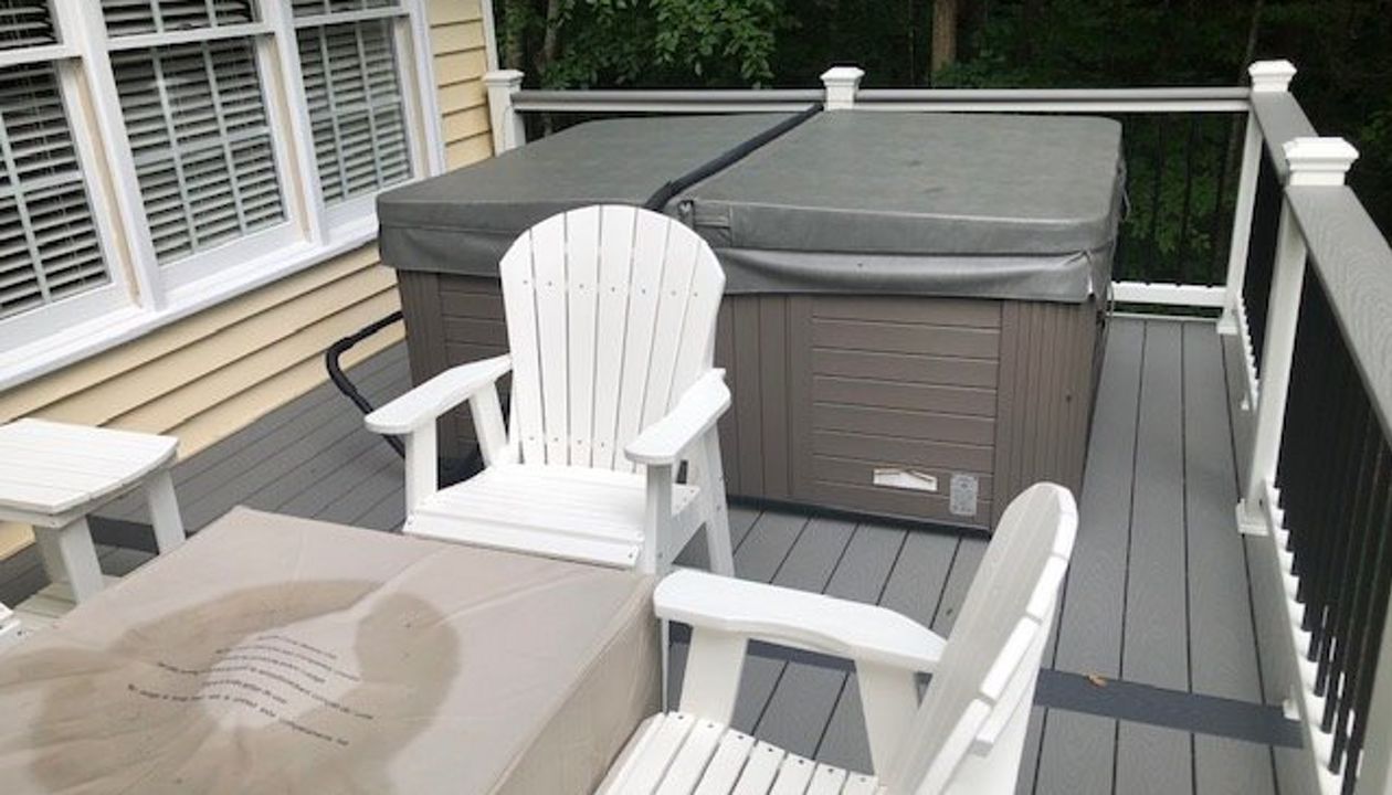 This Trex deck has a great entertaining & dinning area as well as a relaxation element with the new hot tub