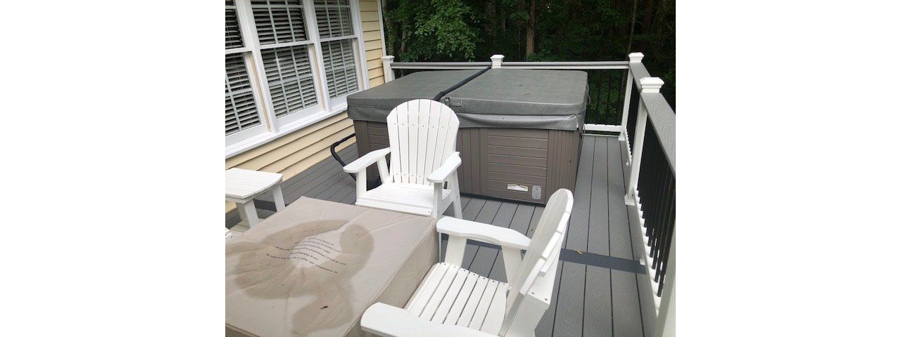 This Trex deck has a great entertaining & dinning area as well as a relaxation element with the new hot tub