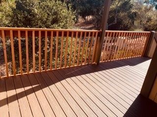 Trex Transcend Tropicals Spiced Rum with redwood railing
