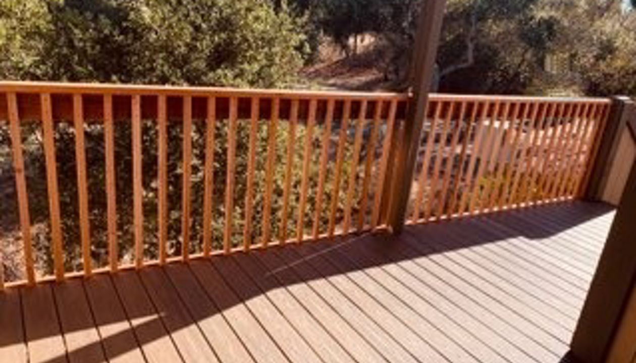 Trex Transcend Tropicals Spiced Rum with redwood railing