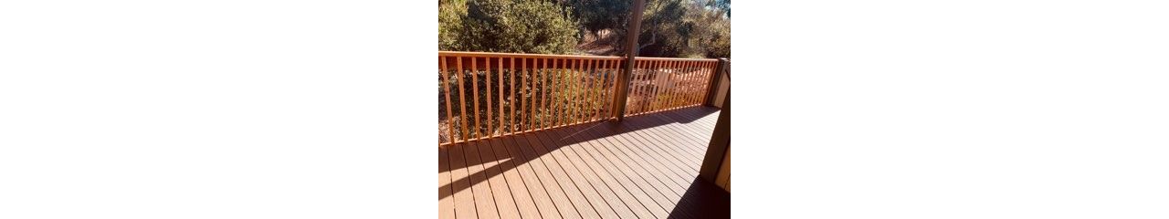 Trex Transcend Tropicals Spiced Rum with redwood railing