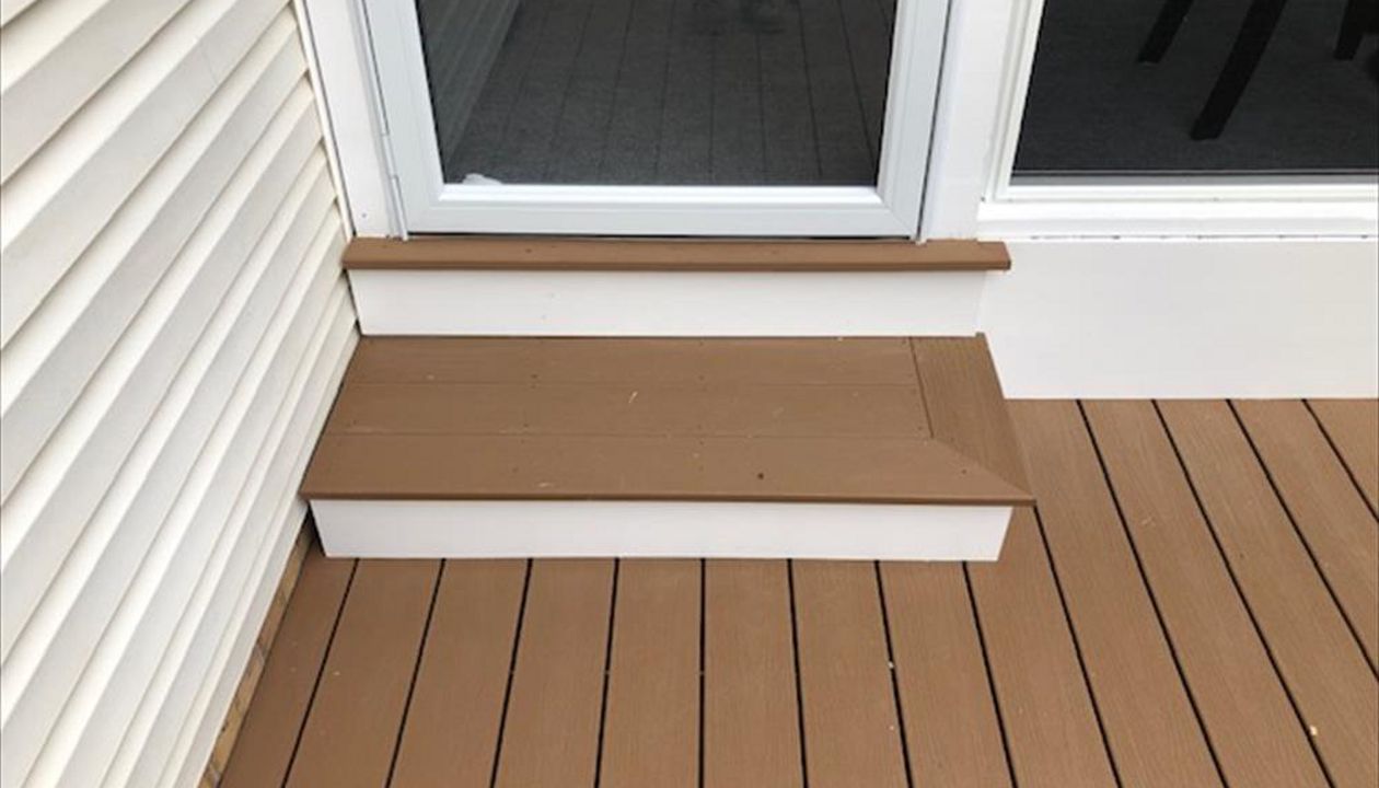 Trex Enhance Beach Dune looks great trimmed out with white.