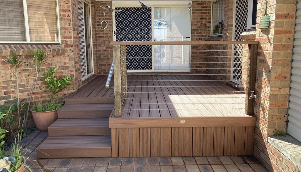 Trex tiki torch the deck for a simple space.