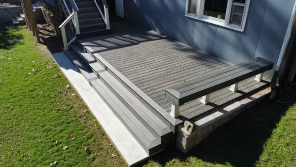 Beautiful Built-In Custom Bench in 2-Tier 800 Square Foot Deck, Trex Transcend Island Mist Decking with Trex Transcend Railings and Cocktail Rails, in Ipswich, MA