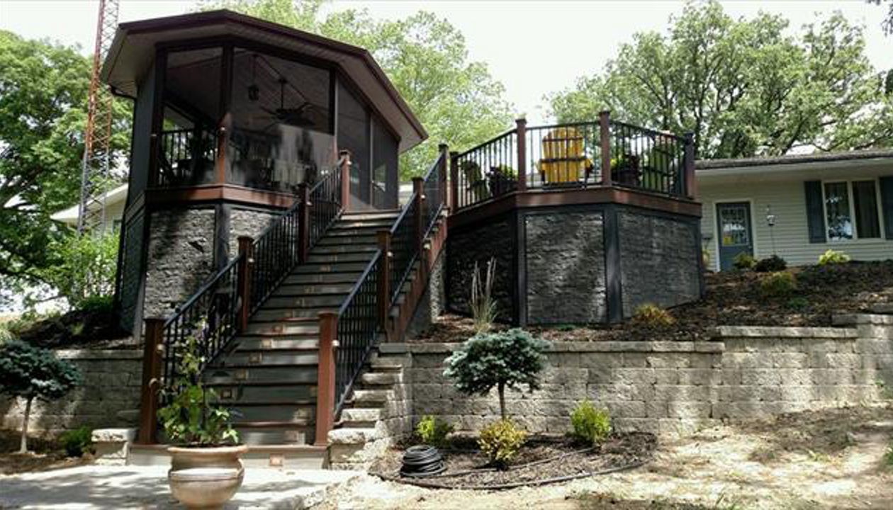 Trex deck with screened in room; protection from bugs, equipped with t.v., to entertain and fan to cool off on hot summer nights