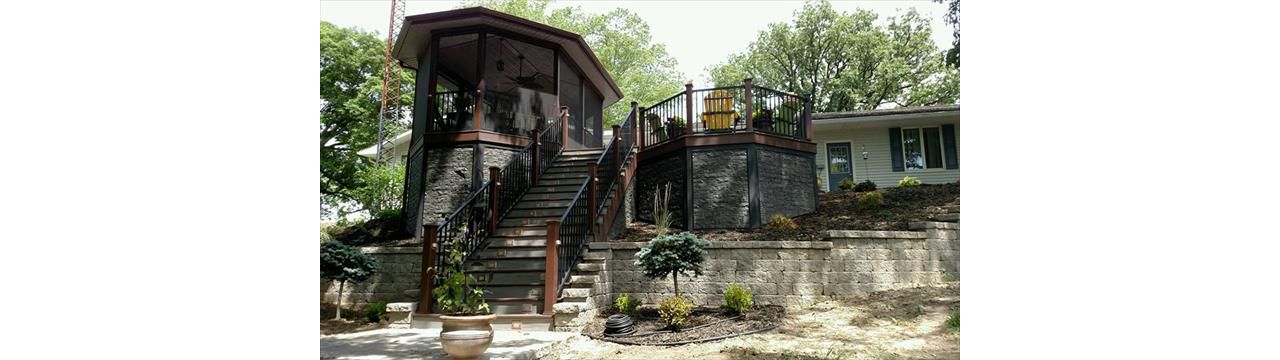 Trex deck with screened in room; protection from bugs, equipped with t.v., to entertain and fan to cool off on hot summer nights