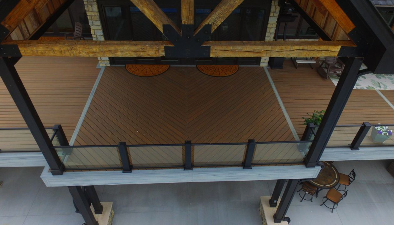 1700 sqft Trex Enhanced Naturals Coastal Bluff with Foggy Warf Picture Frame, Herringbone Pattern Backdoor to Front of Deck