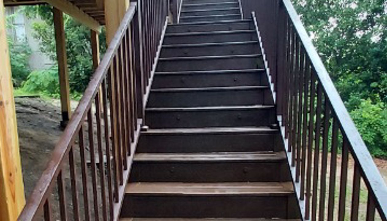 Multi-Tiered Covered Deck, Stairs with Lighting and Bronze Signature Railings