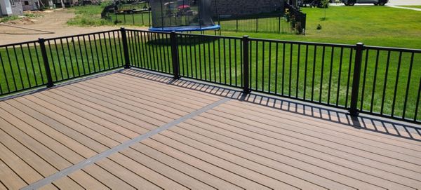 Trex Enhance Naturals Toasted Sand with Coastal Bluff Border Trex Black Signature railing. Chesterfield,Mi