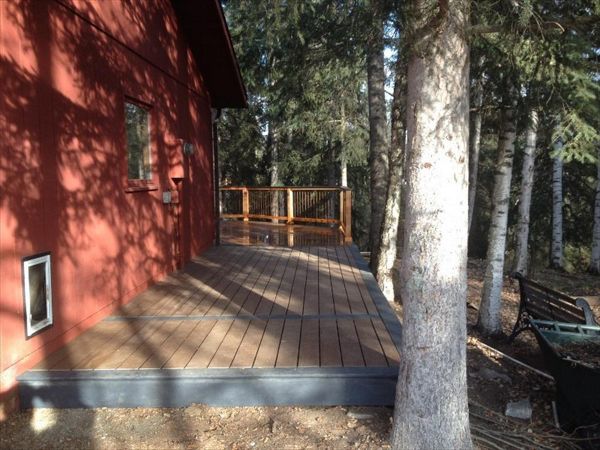 This Beauty is Trex select Saddle with a Winchester Grey boarder and skirt