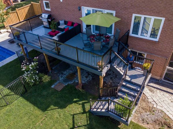 Grey Composite Decking using Select Pebble Grey with Winchester Grey trim - Orangeville, Caledon, Alliston, Bolton