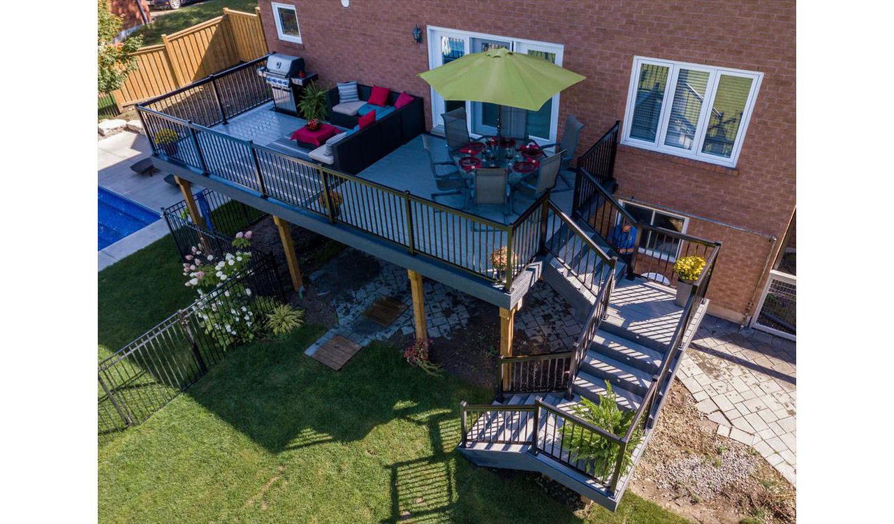 Grey Composite Decking using Select Pebble Grey with Winchester Grey trim - Orangeville, Caledon, Alliston, Bolton