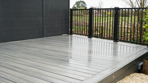 Here we are in stotfold bedfordshire with this beauty, we replaced a rotten old timber deck with this stunning trex decking in the very popular island mist colour with trex signature railings and trex post lights along with new matching composite fencing.