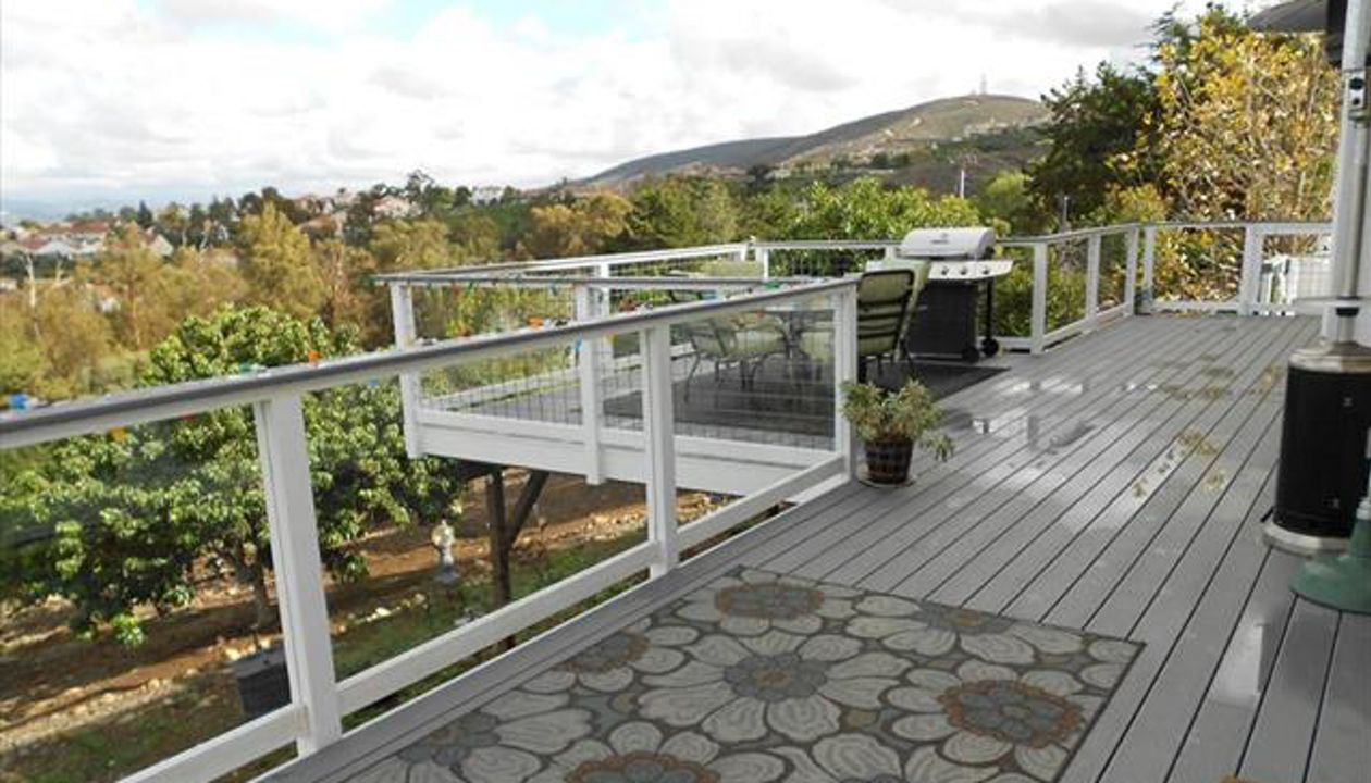 Trex Pebble Grey decking with glass railing, San Marcos, CA