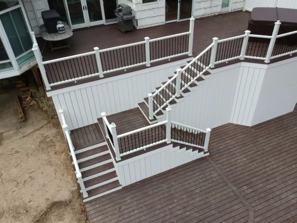 Lava Rock multi-level deck with white PVC skirting