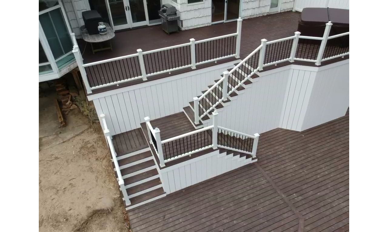Lava Rock multi-level deck with white PVC skirting