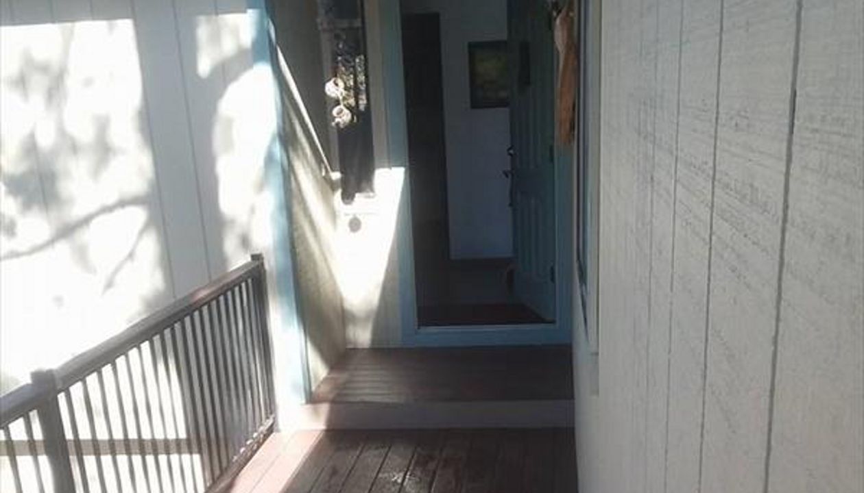 Prescott AZ. Lava Rock with groove, hidden clips. Trex joist tape.