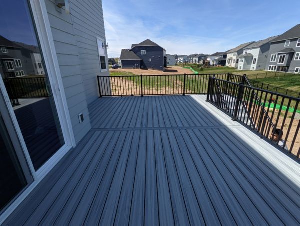 Trex Foggy Wharf Color with black aluminum railings!