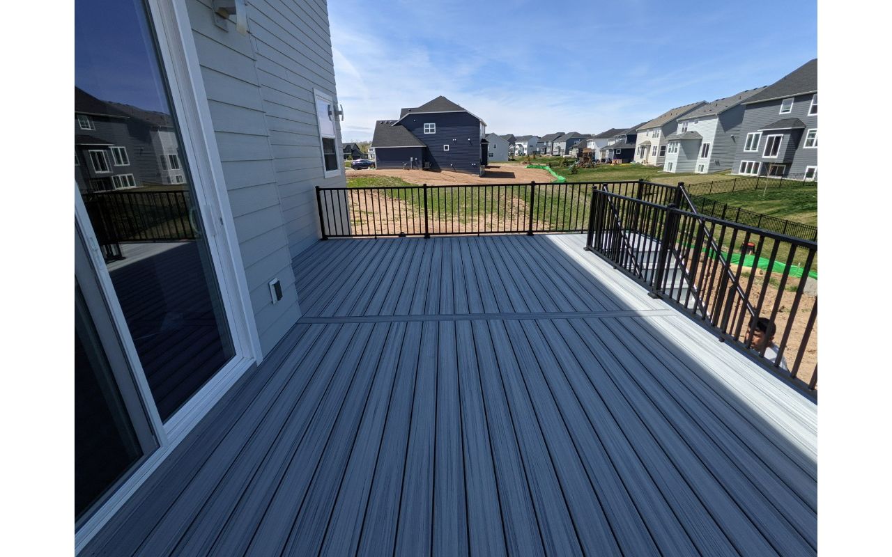 Trex Foggy Wharf Color with black aluminum railings!