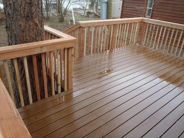 Trex Tree House with a redwood railing