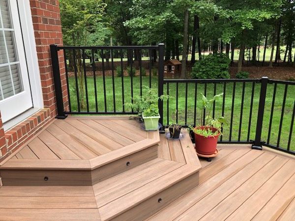 Trex Signature Black railing & lighting makes this project pop