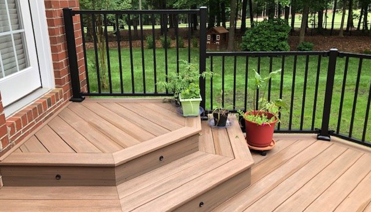 Trex Signature Black railing & lighting makes this project pop