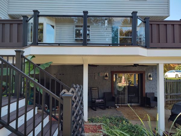 Challenges accepted- Trex Signature Glass Railing, Trex Seclusions privacy walls & finished outdoor living area under Trex RainEscape