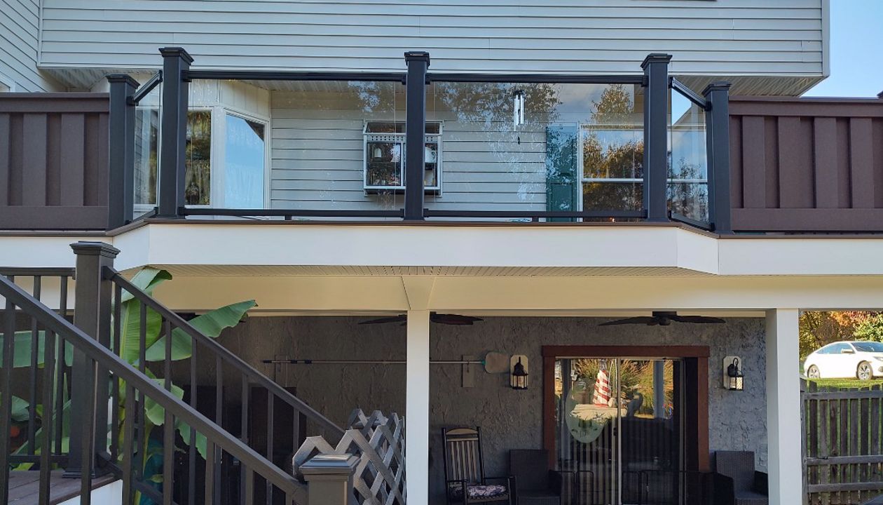 Challenges accepted- Trex Signature Glass Railing, Trex Seclusions privacy walls & finished outdoor living area under Trex RainEscape