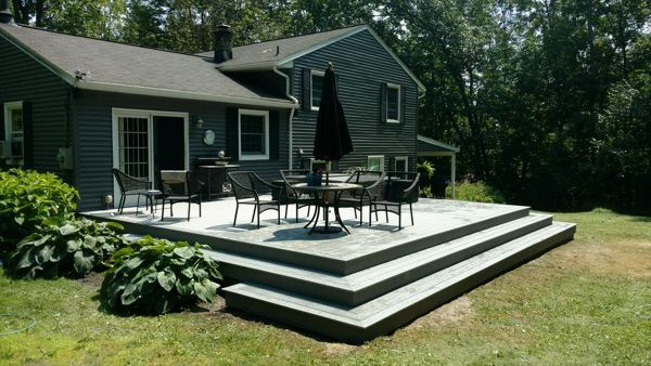 Try a design with wrap around stairs for a more open feeling on your Trex deck.
