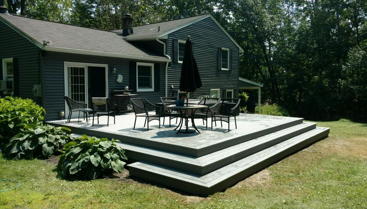 Try a design with wrap around stairs for a more open feeling on your Trex deck.
