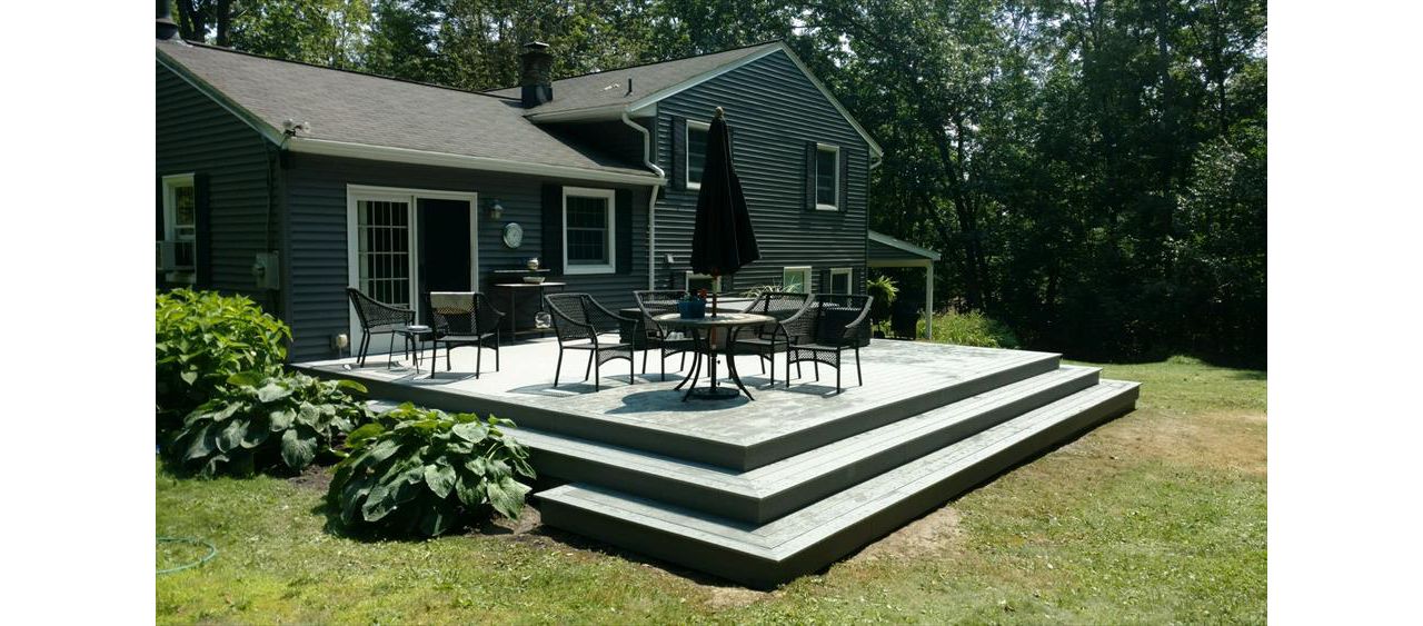 Try a design with wrap around stairs for a more open feeling on your Trex deck.