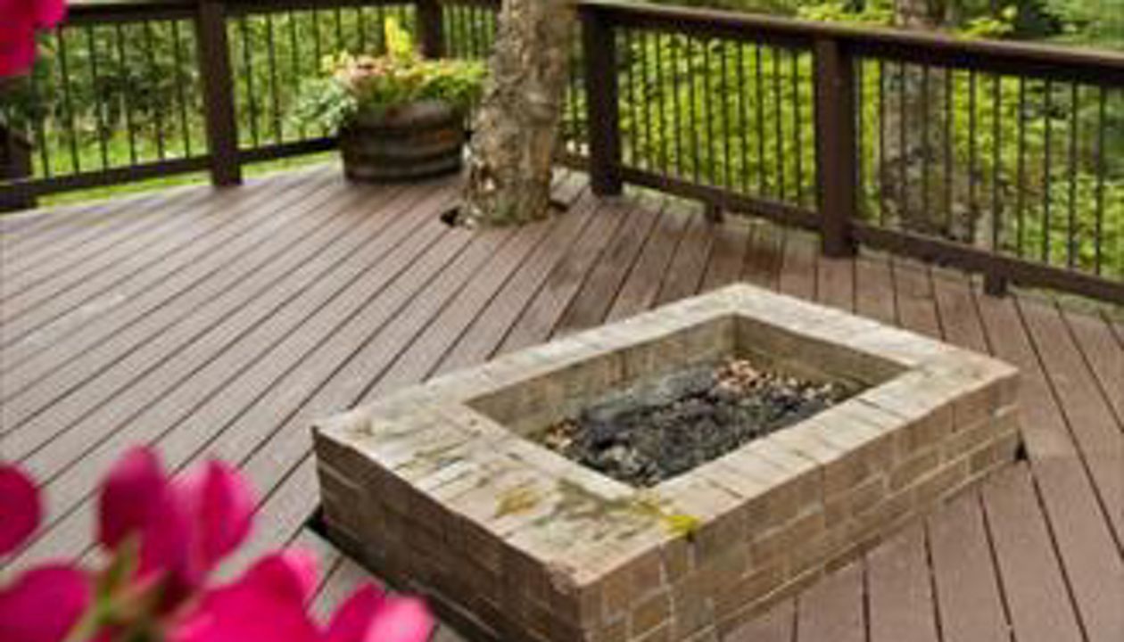 Built in fireplace by Treeline Construction adds spice!