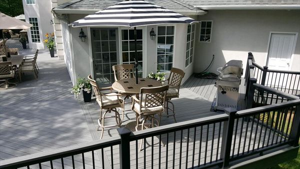 Island Mist with Clam Shell Border, Black Aluminum Balusters, Cocktail Railing