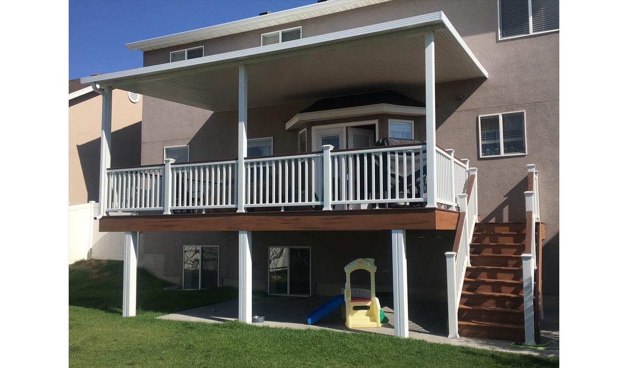 Elveations Steel Framing with Tiki Torch Decking, White Transcend Rail with Fire Pit Cocktail Rail