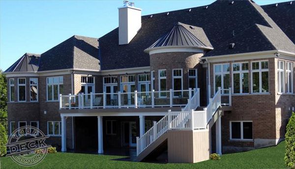 Estate home curved Trex deck by Your Deck Co. in Caledon