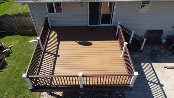 Select Saddle and Woodland Brown accents with Transcend Vintage Lantern and White railings