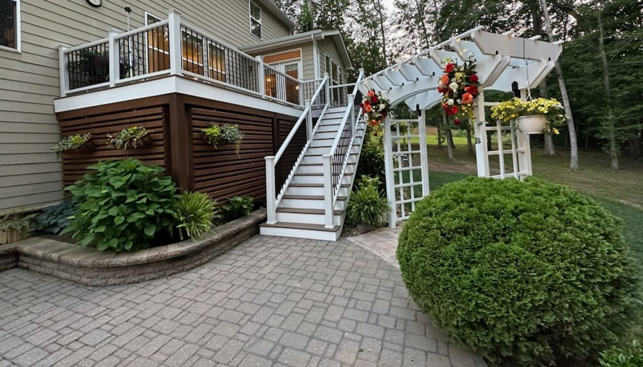 Trex Coastal Bluff With White Trex Transcend Railing and A Custom Under Deck Enclosure, Raleigh NC