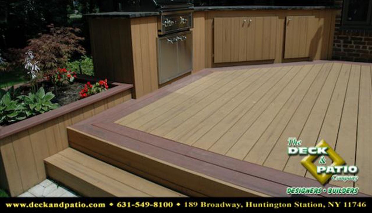 Deck with picture frame border and outdoor kitchen