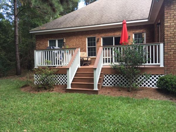 Trex Transcend Tiki Torch deck & Transcend Classic White railing in New Bern, NC.