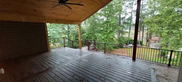 Multi-Tiered Covered Deck and Privacy Fence in Spiced Rum with Bronze Signature Railings