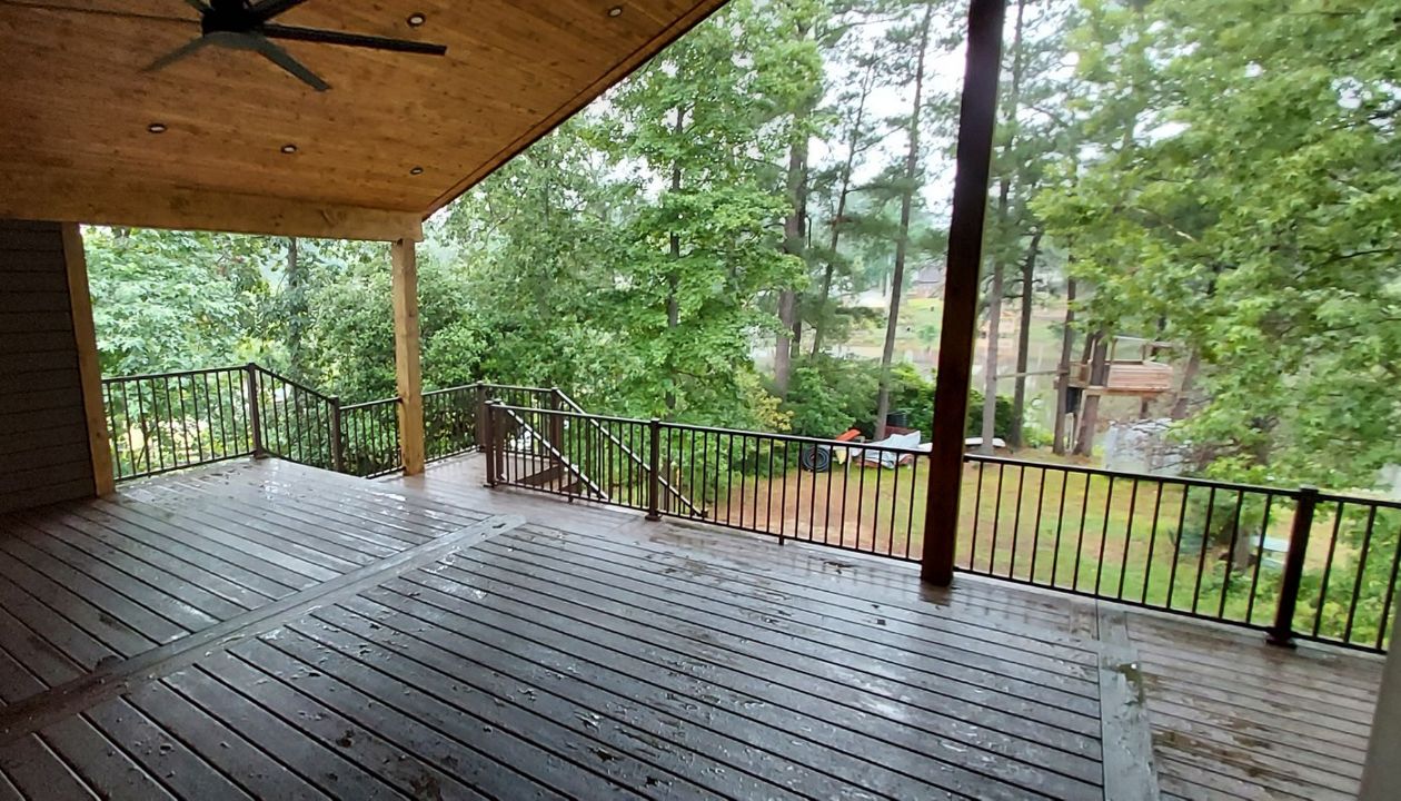 Multi-Tiered Covered Deck and Privacy Fence in Spiced Rum with Bronze Signature Railings