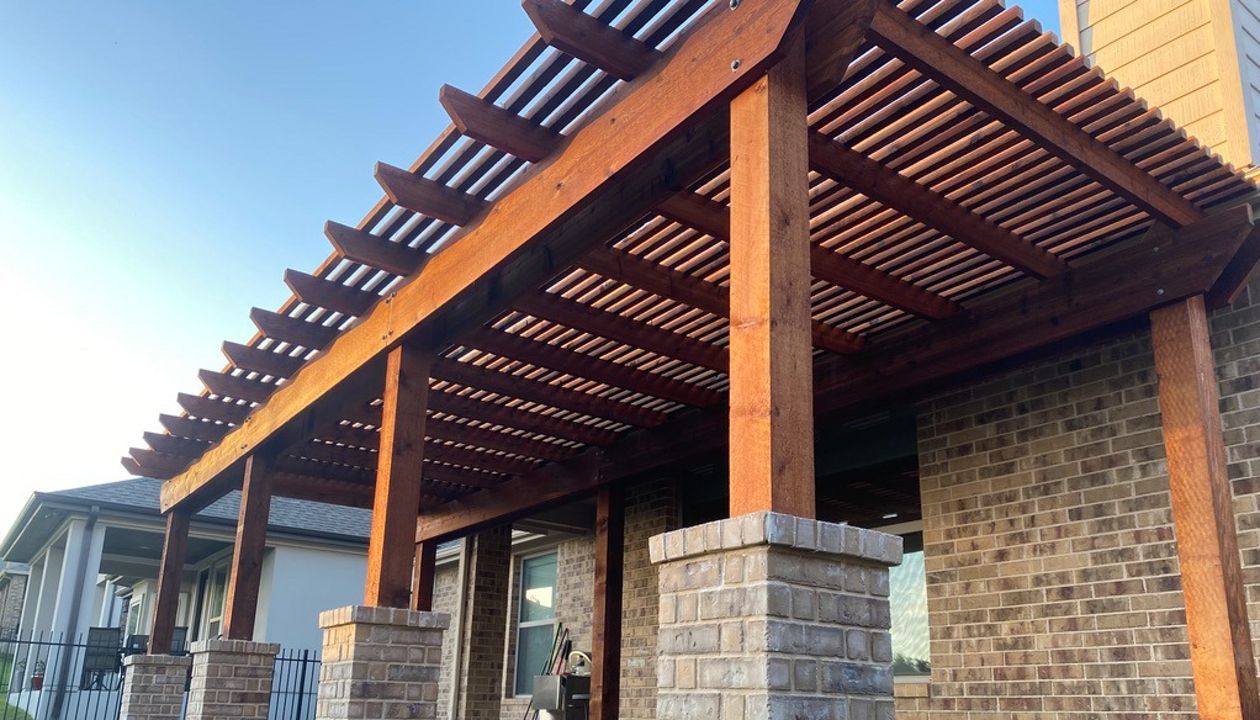 Trex Saddle with Brick Columns and Cedar Shade Arbor