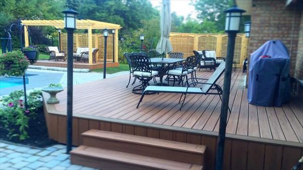 Medium size TREX deck made with Saddle and borders with Woodland Brown, built in:   Aurora, King City, Oak Ridges, Richmond Hill, Newmarket, Toronto, Mississauga, Mount Albert, Vaughan, Bradford, Stouffville