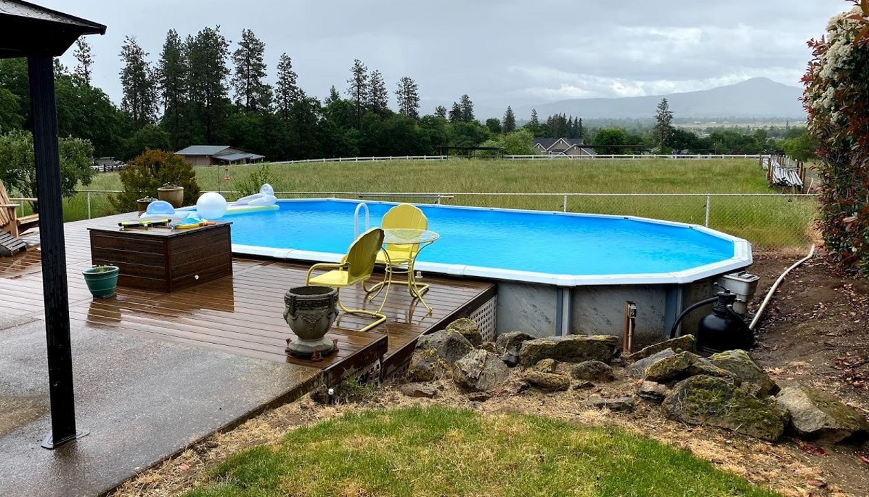 Extend pool deck around pool (Before)