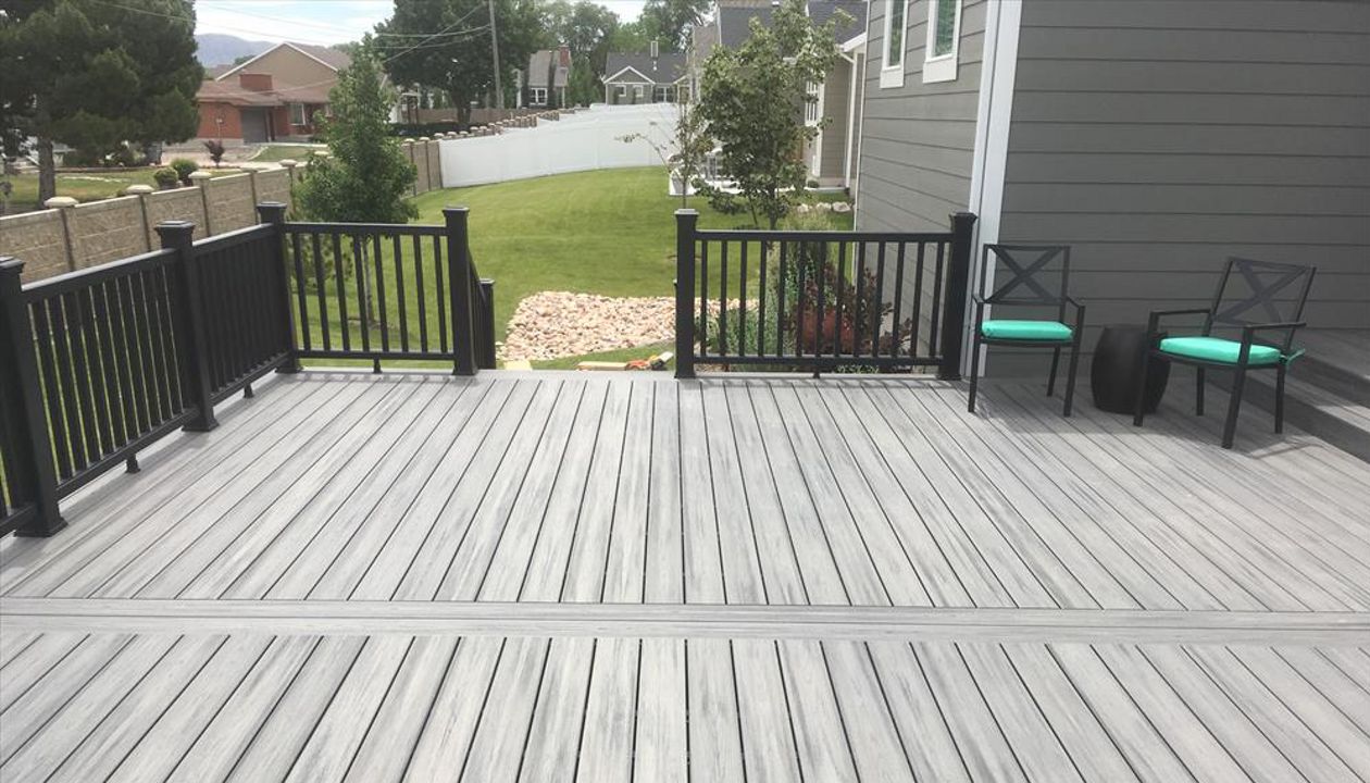 Elevations framing with Transcend Island Mist Decking and Black Transcend Railing
