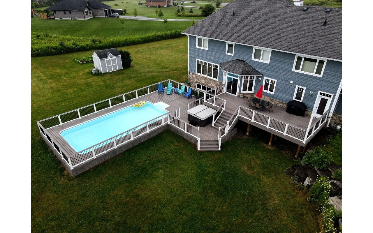 Trex Enhance Rocky Harbor with matching Trex Cocktail Railing. Contact Align Decking today for your custom composite decking needs. Servicing Durham Region, Kawartha Lakes, and the Barrie & Orillia areas.