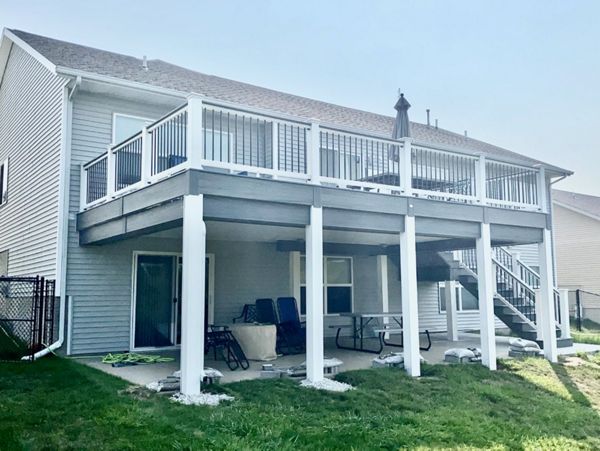 Trex Transcends Island Mist Decking, Select Railings, Rain Escapes Ceiling, & A Lot Of Detail Work