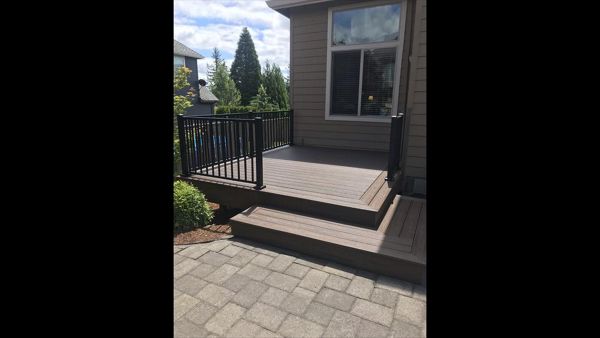 Spiced Rum deck with Trex Signature rails to complete this pristine backyard